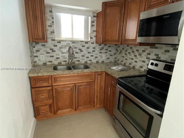1064 NW 103rd St, Miami FL 33150
