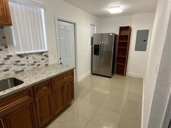 1064 NW 103rd St, Miami FL 33150