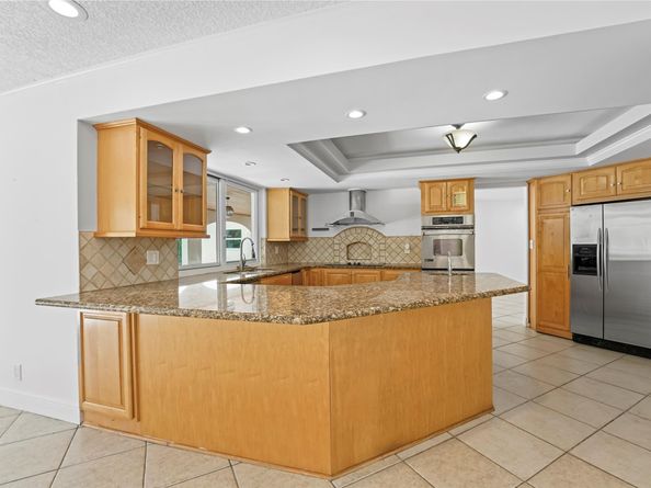 1120 E Tropical Way, Plantation FL 33317