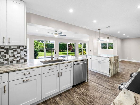 401 French Royale Circle, Atlantis FL 33462
