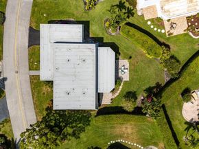 401 French Royale Circle, Atlantis FL 33462