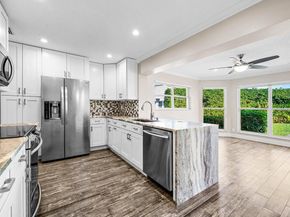 401 French Royale Circle, Atlantis FL 33462