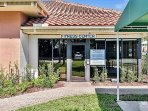 119 Hammocks Court, Greenacres FL 33413