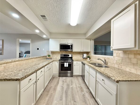 235 E Rainbow Ridge Circle, The Woodlands TX 77381
