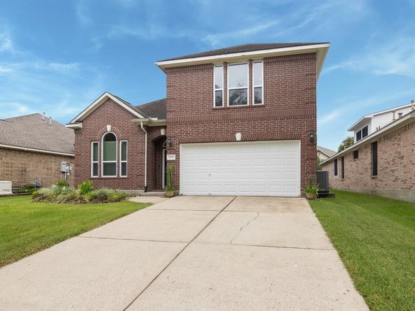 21811 Grand Lancelot Drive, Kingwood TX 77339