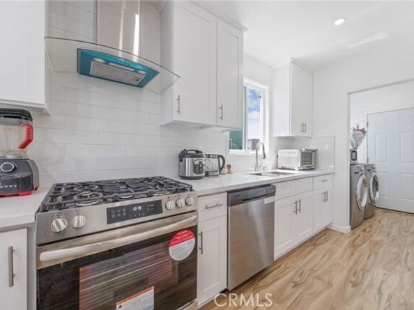7037 Cimarron Street, Los Angeles CA 90047