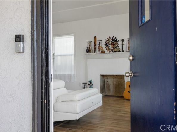 7037 Cimarron Street, Los Angeles CA 90047