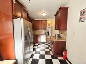 8571 67th ave Avenue, Rego Park NY 11374