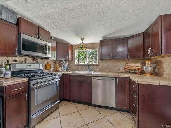 57 Flower Road, Mastic Beach NY 11951