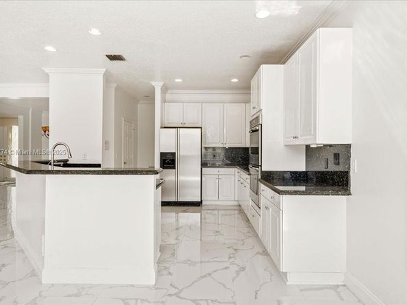 5095 NW 57th Way, Coral Springs FL 33067