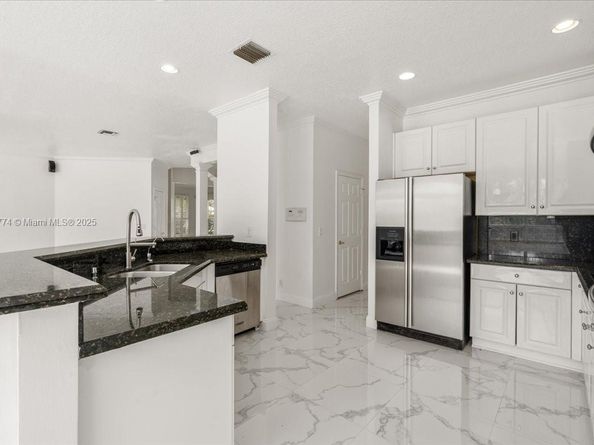 5095 NW 57th Way, Coral Springs FL 33067