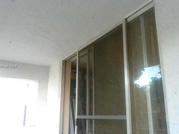 496 NW 165th St Rd D314, Miami FL 33169