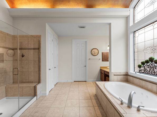 7 N BANTAM WOODS Drive, The Woodlands TX 77382