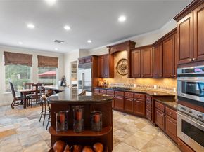 7 N BANTAM WOODS Drive, The Woodlands TX 77382