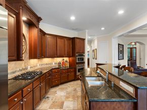 7 N BANTAM WOODS Drive, The Woodlands TX 77382