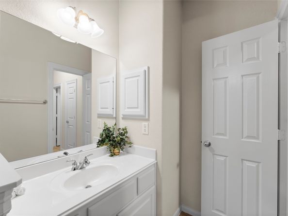 7 N BANTAM WOODS Drive, The Woodlands TX 77382
