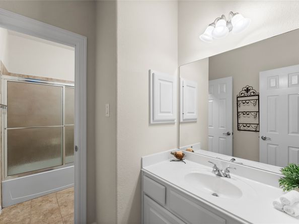 7 N BANTAM WOODS Drive, The Woodlands TX 77382