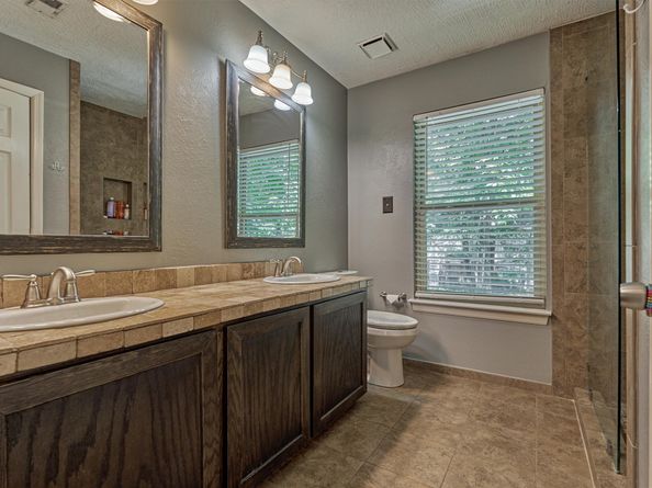 100 W Rainbow Ridge Circle, The Woodlands TX 77381
