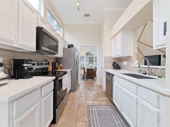 36 N Rain Forest Court, Spring TX 77380