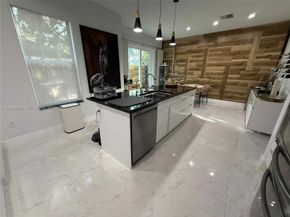 6923 Julia Gardens Drive, Coconut Creek FL 33073