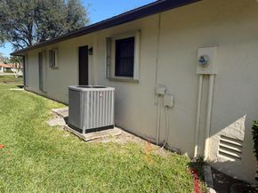 6313 Tall Cypress Circle, Greenacres FL 33463