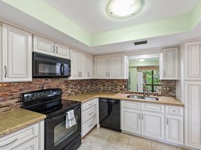 413 Brackenwood Lane S, Palm Beach Gardens FL 33418