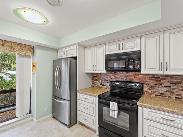 413 Brackenwood Lane S, Palm Beach Gardens FL 33418