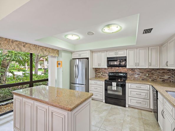 413 Brackenwood Lane S, Palm Beach Gardens FL 33418