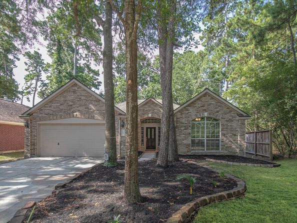 83 Hidden Meadow Drive, The Woodlands TX 77382