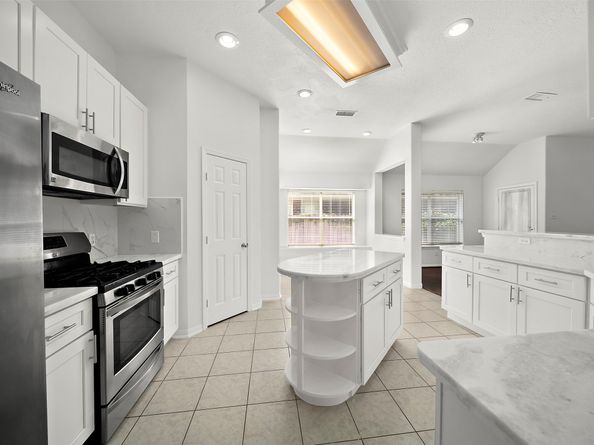 83 Hidden Meadow Drive, The Woodlands TX 77382