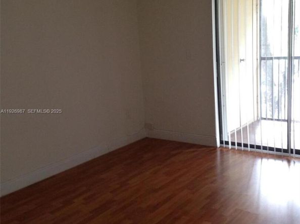 15689 SW 106th Ln 702, Miami FL 33196