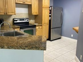 8901 Wiles Rd 103, Coral Springs FL 33067