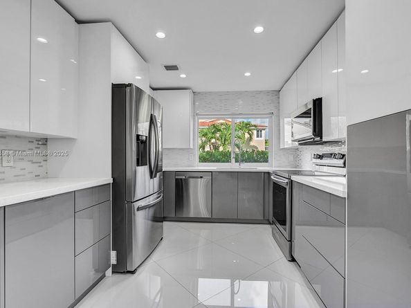 698 Deer Creek Corona Way, Deerfield Beach FL 33442
