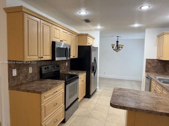 1328 NW 86th Way, Coral Springs FL 33071
