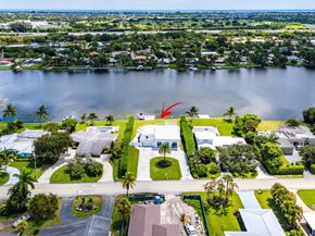 7150 W Lake Drive, Lake Clarke Shores FL 33406