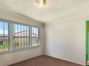 9023 S Halldale Avenue, Los Angeles CA 90047