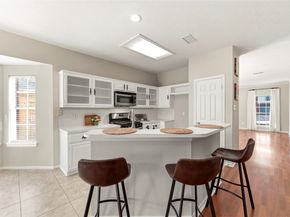 7718 Woodlett Court, Houston TX 77095