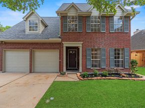 7718 Woodlett Court, Houston TX 77095