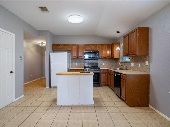 12001 Buzz Schneider LN, Austin TX 78748