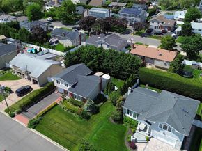 39 Brewster Road W, Massapequa NY 11758