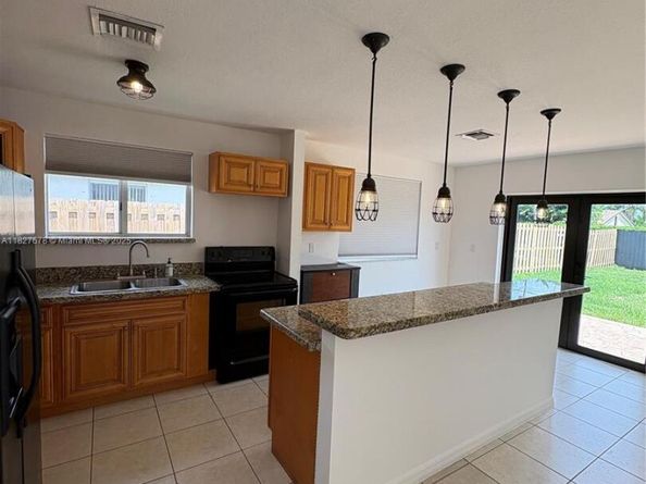 16266 SW 303rd Ln, Homestead FL 33033