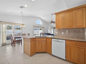 112 Camelot Ct, Royal Palm Beach FL 33411