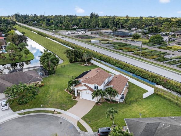 112 Camelot Ct, Royal Palm Beach FL 33411