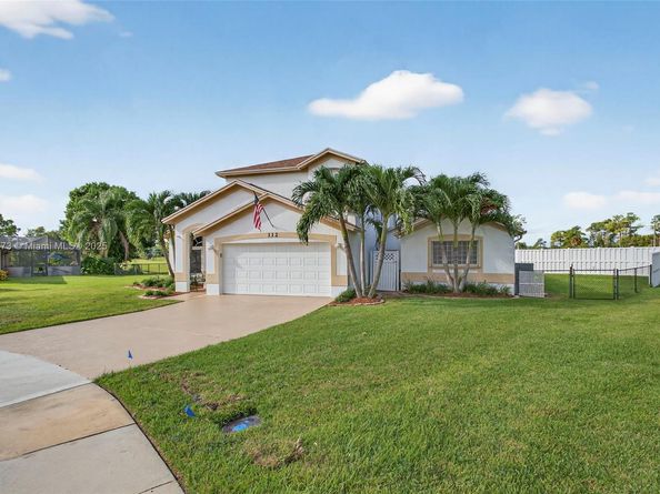 112 Camelot Ct, Royal Palm Beach FL 33411