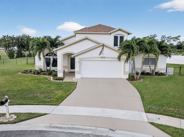 112 Camelot Ct, Royal Palm Beach FL 33411