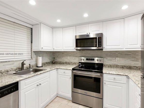 9430 Live Oak Pl 407, Davie FL 33324