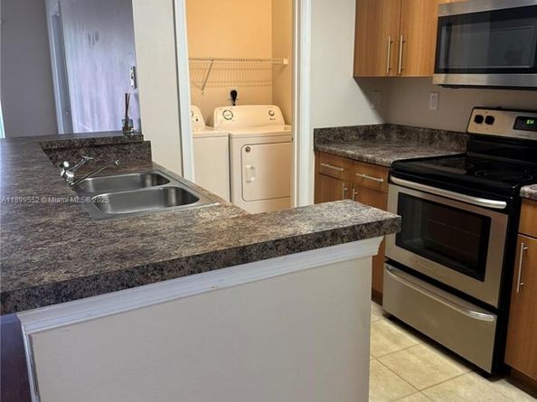 5840 W Sample Rd 306, Coral Springs FL 33067