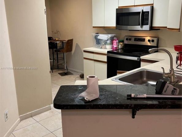 8871 Wiles Rd 208, Coral Springs FL 33067