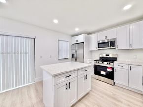 404 Sandtree Dr, Palm Beach Gardens FL 33403