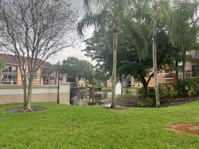 8821 Wiles Road 102, Coral Springs FL 33067